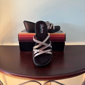 Skechers Rumblers Wild Child Black and Silver Mules with Strappy Design